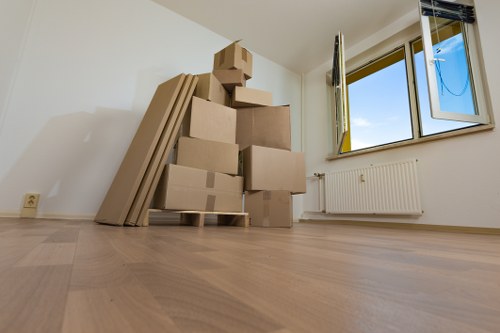 Prepared boxes and furniture ready for a man and van collection in Southfields
