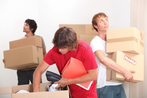 Packed boxes and furniture ready for a Southfields apartment relocation