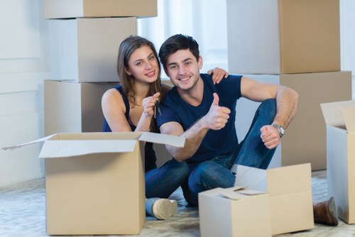 Packed boxes and furniture ready for a home move in Southfields
