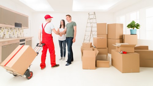 Local moving team handling student belongings in a Southfields property