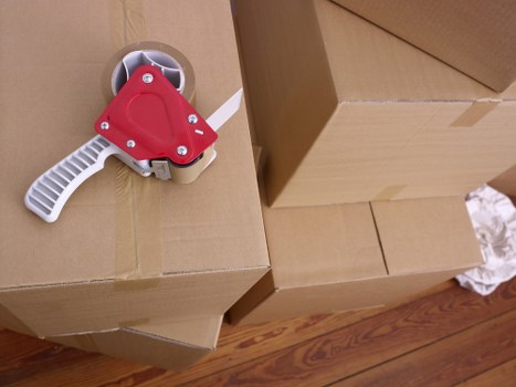 Local team collecting sofas, beds, and wardrobes in Southfields